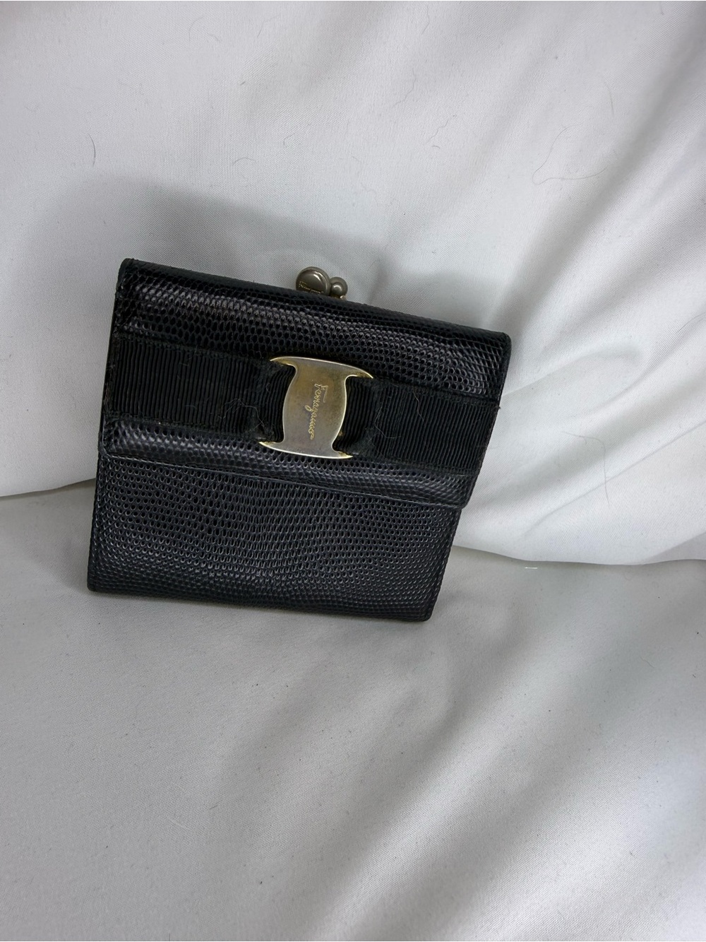 Salvatore Ferragamo black leather compact wallet with gold-tone logo clasp
